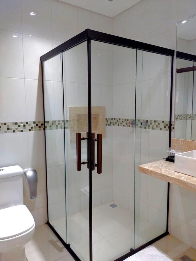 Guess Hotel & Motel Гуарульос Екстериор снимка
