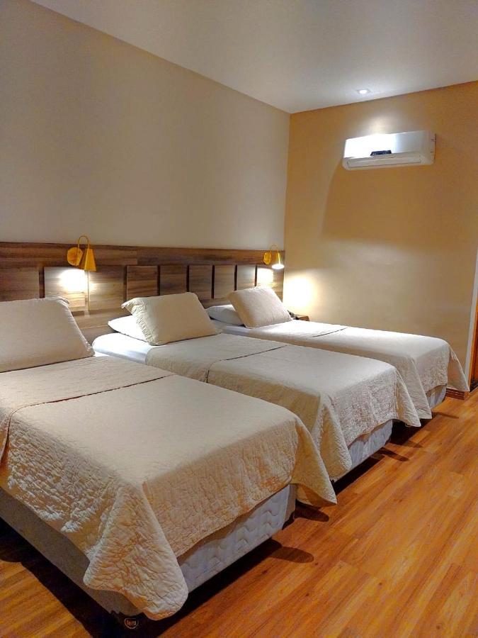 Guess Hotel & Motel Гуарульос Екстериор снимка